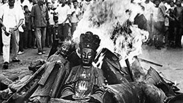 CE3220-1-Buddhist-statues-burned.jpg