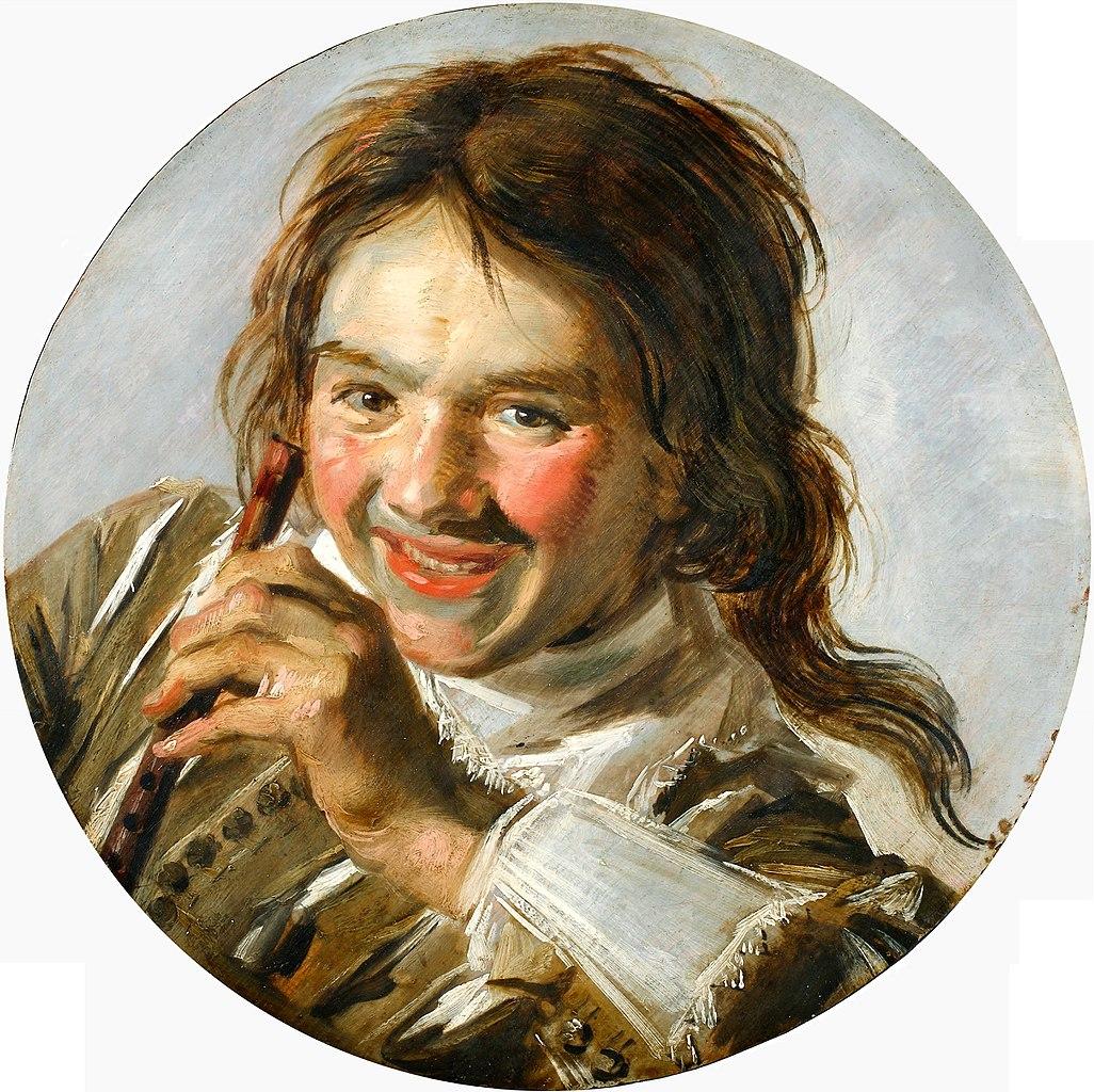 Laughing boy holding a flute (Hearing).jpg