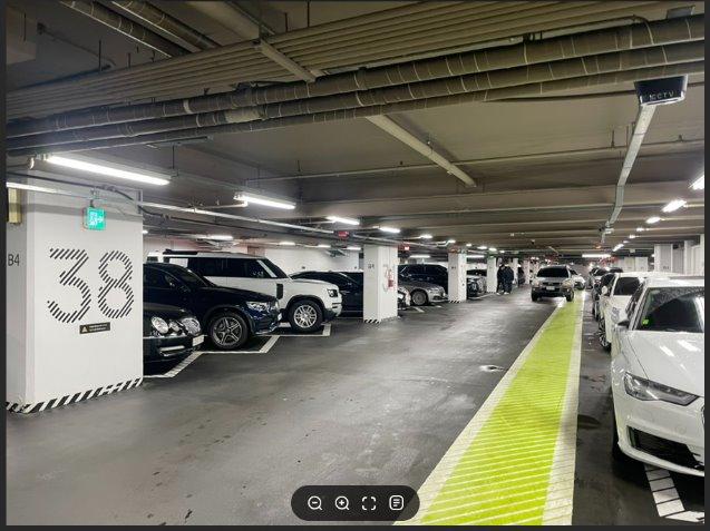 A parking garage with cars AI-generated content may be incorrect_.jpg