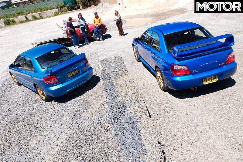 2005-subaru-impreza-wrx-sti-vs-kia-rio-comparison-review-classic-motor-rear.jpg