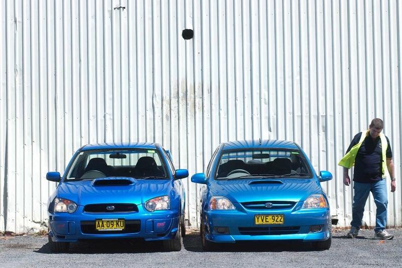 2005-Subaru-Impreza-WRX-STi-vs-Kia-Rio-comparison-review-classic-MOTOR.jpg