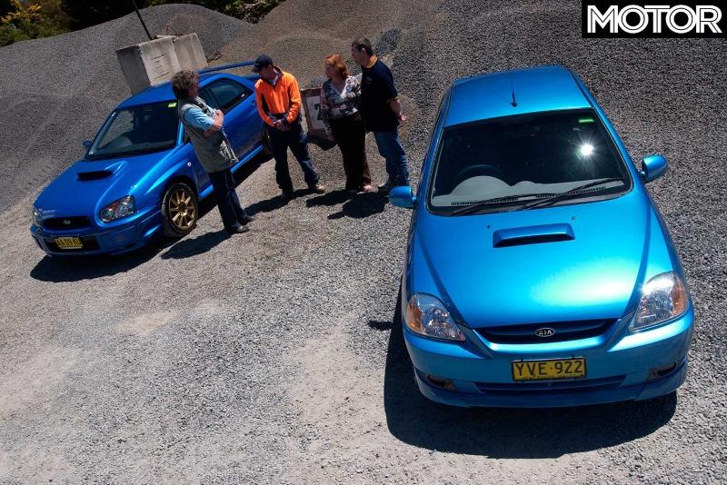 2005-Subaru-Impreza-WRX-STi-vs-Kia-Rio-comparison-look.jpg