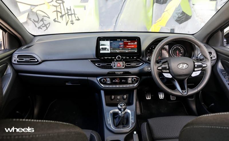 2021_Hyundai_i30_N_hatchback_polar_white_interior_dashboard.jpg