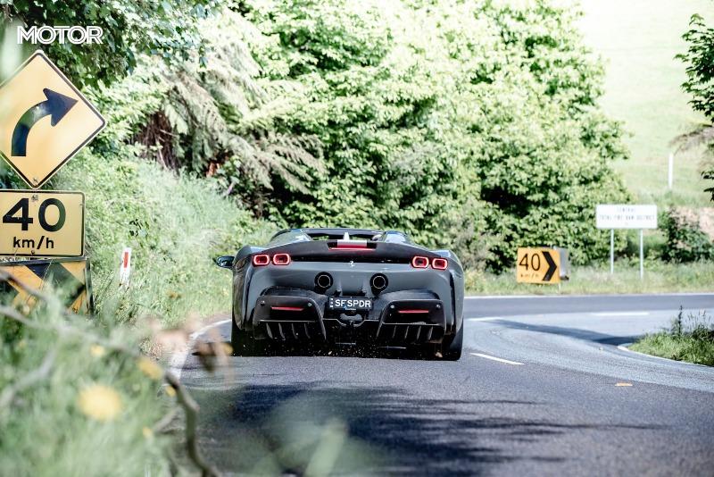 2021_Ferrari_SF90_Spider_Assetto_Fiorano_Grigio_Scuro_Australia_dynamic_rear_EDewar.jpg