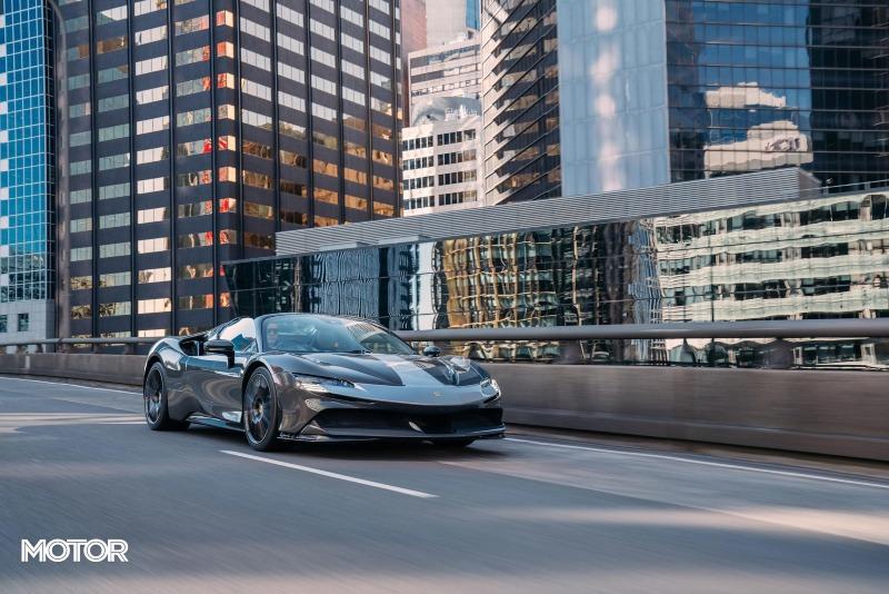 2021_Ferrari_SF90_Spider_Assetto_Fiorano_Grigio_Scuro_Australia_dynamic_front_city_3.jpg