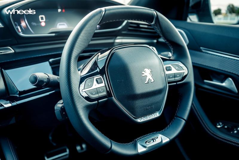 2021_Peugeot_508_GT_Fastback_Celebes_Blue_Australia_interior_steering_wheel_EDewar.jpg