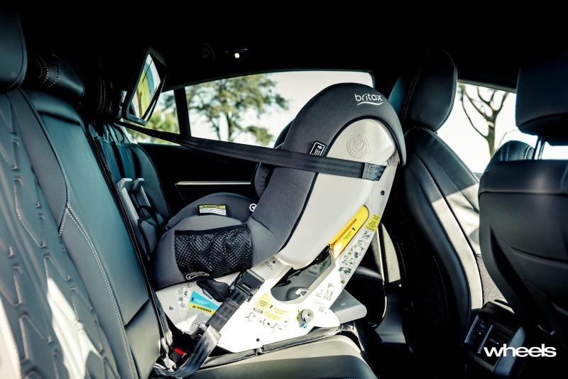 2021_Peugeot_508_GT_Fastback_Celebes_Blue_Australia_interior_rear_seat_child_seat_EDewar.jpg