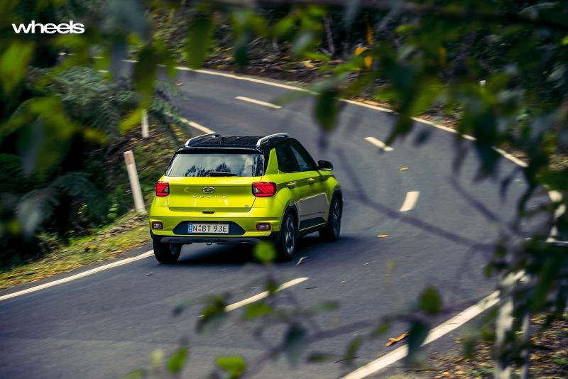 2020_Hyundai_Venue_Elite_Acid_Yellow_Australia_dynamic_cornering_rear_top_2_ABrook.jpg