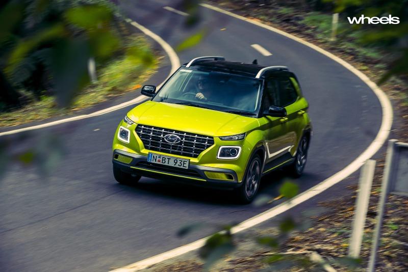 2020_Hyundai_Venue_Elite_Acid_Yellow_Australia_dynamic_cornering_front_top_ABrook.jpg