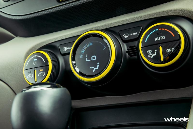 2020_Hyundai_Venue_Elite_Acid_Yellow_Australia_interior_climate_control_panel_ABrook.jpg