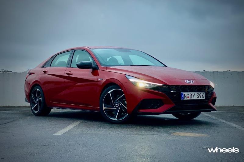 2021_Hyundai_i30_Sedan_N_Line_Premium_firey_red_static_front.jpg