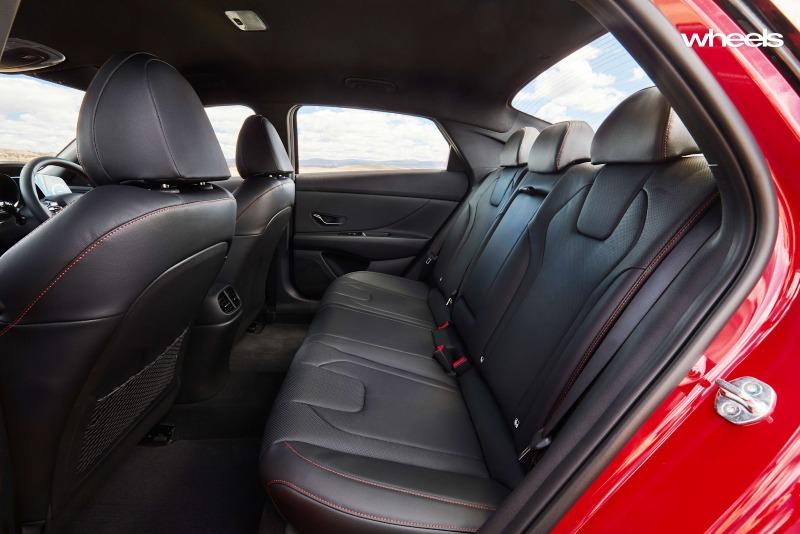 2021_Hyundai_i30_Sedan_N_Line_Premium_firey_red_interior_rear_seat_legroom_headroom_space.jpg