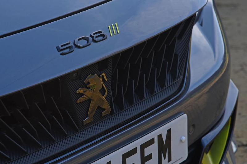 4-peugeot-508-pse-2021-long-term-review-nose-badge.jpg