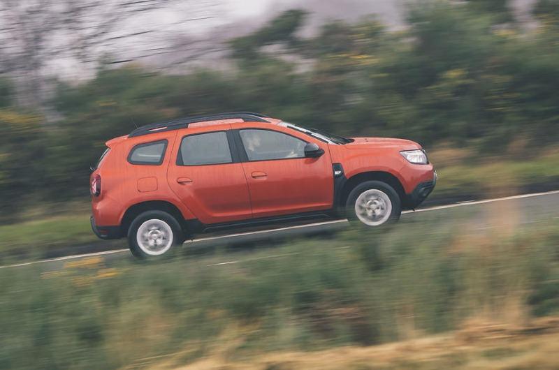 2-dacia-duster-2x4-2022-uk-first-drive-review-side-pan.jpg