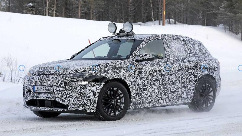 2023-audi-q6-e-tron-new-spy-shots-on-snow-wearing-production-headlights-and-taillights (3).jpg