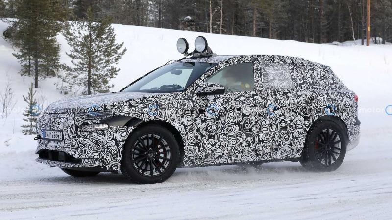 2023-audi-q6-e-tron-new-spy-shots-on-snow-wearing-production-headlights-and-taillights (4).jpg