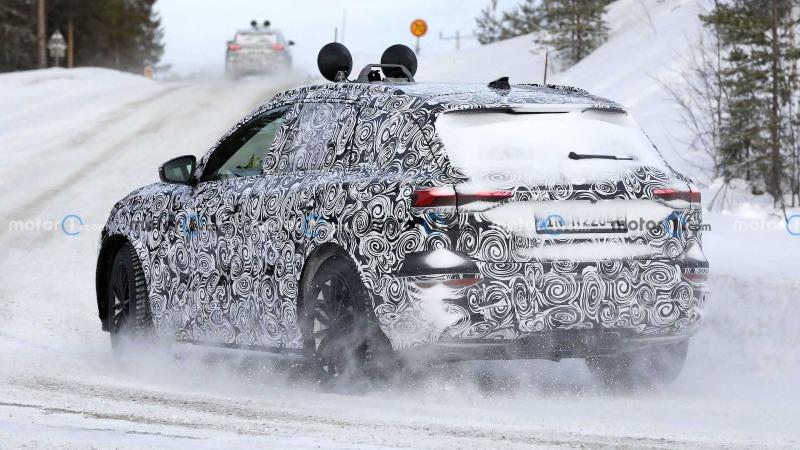 2023-audi-q6-e-tron-new-spy-shots-on-snow-wearing-production-headlights-and-taillights (8).jpg