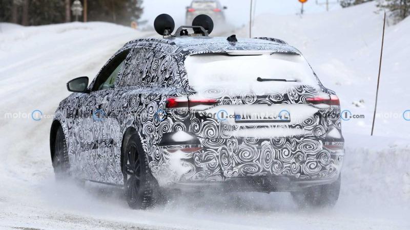 2023-audi-q6-e-tron-new-spy-shots-on-snow-wearing-production-headlights-and-taillights (9).jpg