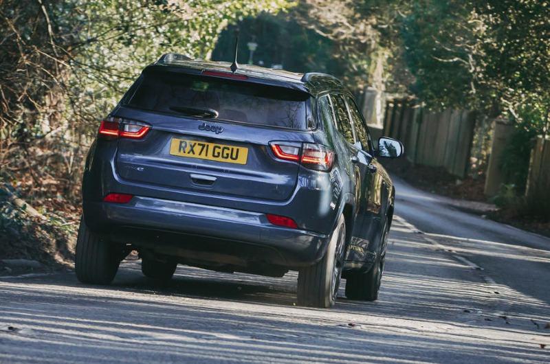 3-jeep-compass-4xe-2022-road-test-review-cornering-rear.jpg