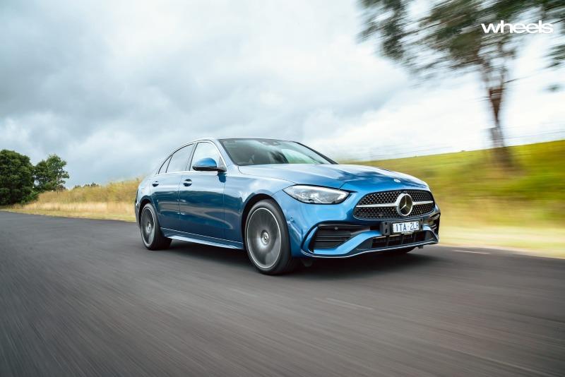 2022_Mercedes-Benz_C300_Spectral_Blue_Metallic_Australia_dynamic_front_10.jpg