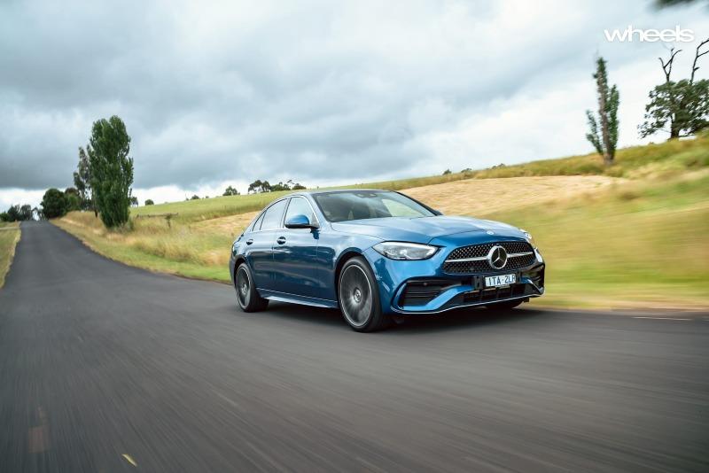 2022_Mercedes-Benz_C300_Spectral_Blue_Metallic_Australia_dynamic_front_11.jpg