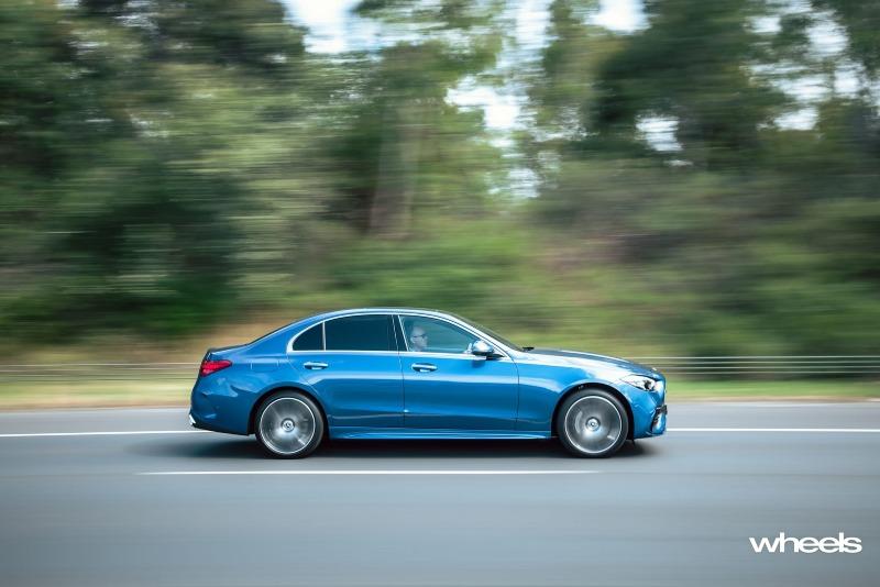 2022_Mercedes-Benz_C300_Spectral_Blue_Metallic_Australia_dynamic_side_01.jpg