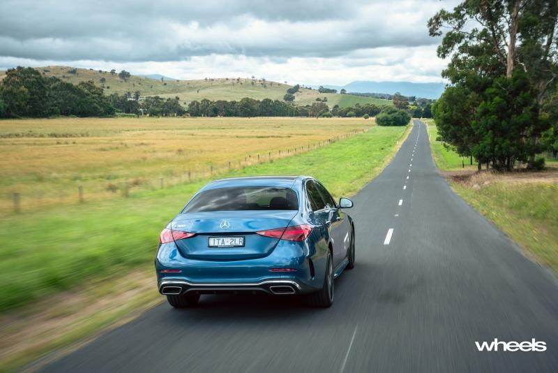 2022_Mercedes-Benz_C300_Spectral_Blue_Metallic_Australia_dynamic_rear_04.jpg