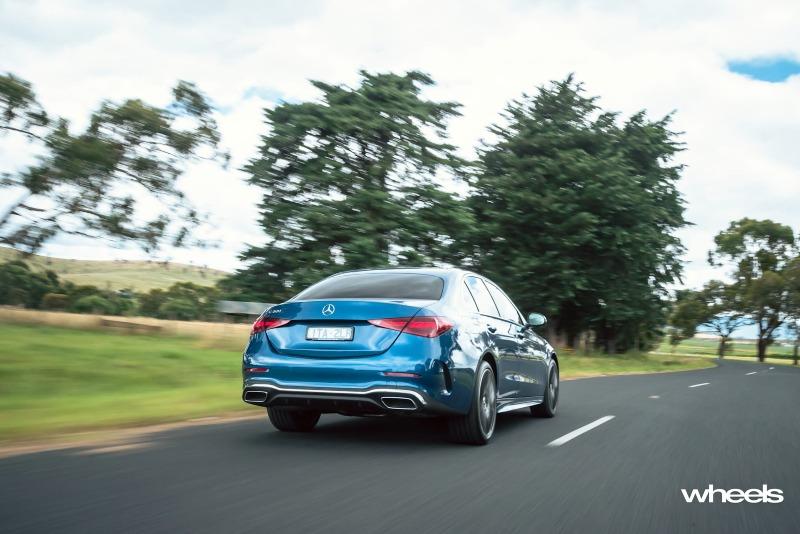 2022_Mercedes-Benz_C300_Spectral_Blue_Metallic_Australia_dynamic_rear_03.jpg