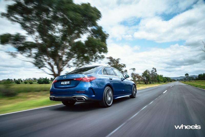 2022_Mercedes-Benz_C300_Spectral_Blue_Metallic_Australia_dynamic_rear_02.jpg