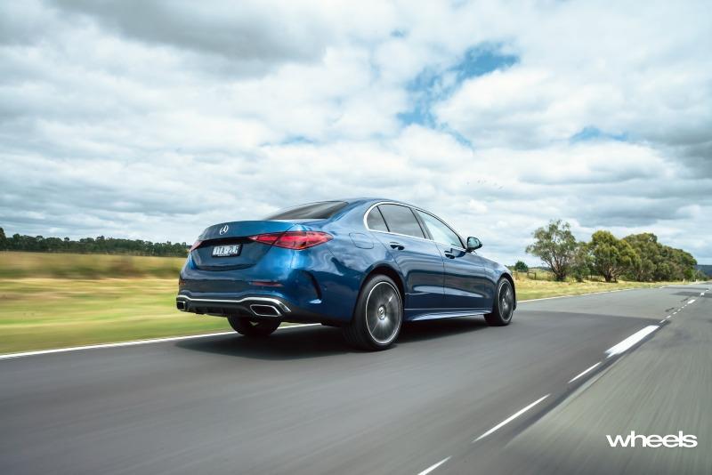 2022_Mercedes-Benz_C300_Spectral_Blue_Metallic_Australia_dynamic_rear_05.jpg