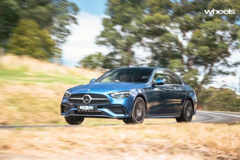 2022_Mercedes-Benz_C300_Spectral_Blue_Metallic_Australia_dynamic_front_16.jpg
