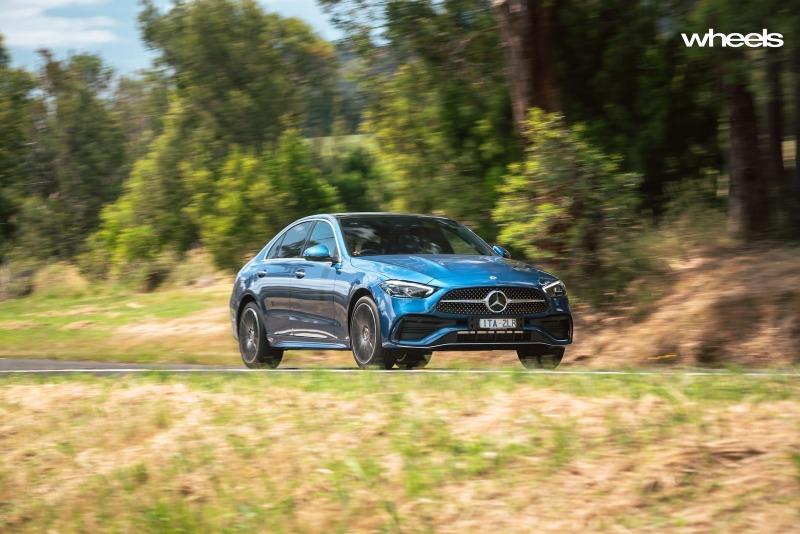 2022_Mercedes-Benz_C300_Spectral_Blue_Metallic_Australia_dynamic_front_15.jpg