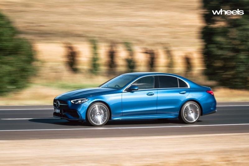 2022_Mercedes-Benz_C300_Spectral_Blue_Metallic_Australia_dynamic_front_20.jpg