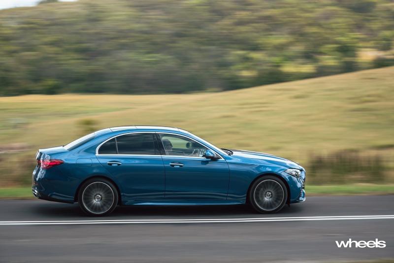 2022_Mercedes-Benz_C300_Spectral_Blue_Metallic_Australia_dynamic_side_02.jpg