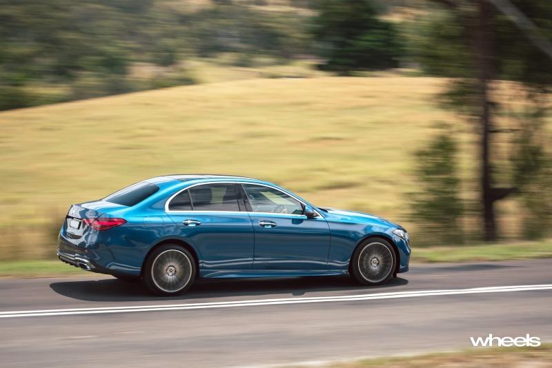 2022_Mercedes-Benz_C300_Spectral_Blue_Metallic_Australia_dynamic_side_07.jpg