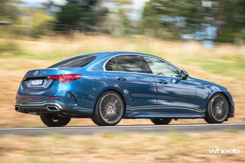 2022_Mercedes-Benz_C300_Spectral_Blue_Metallic_Australia_dynamic_rear_06.jpg