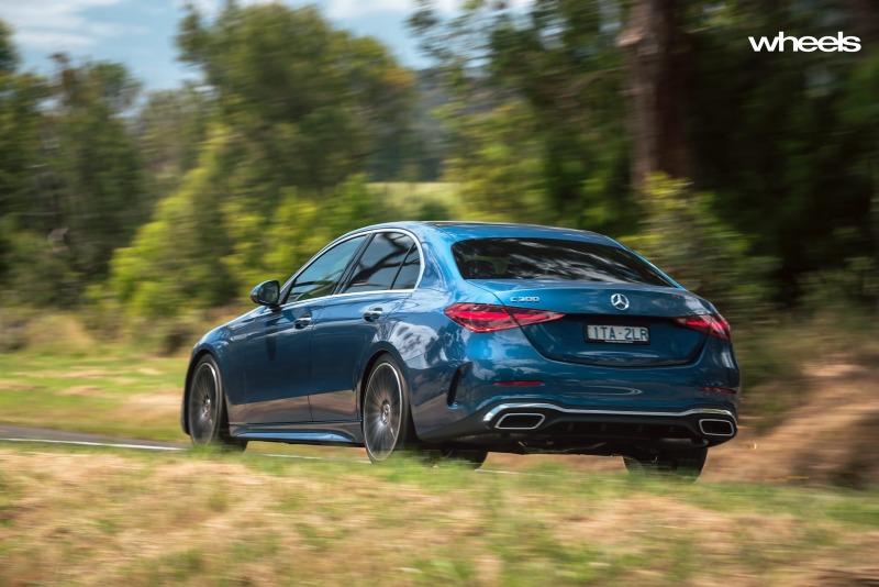 2022_Mercedes-Benz_C300_Spectral_Blue_Metallic_Australia_dynamic_rear_004.jpg