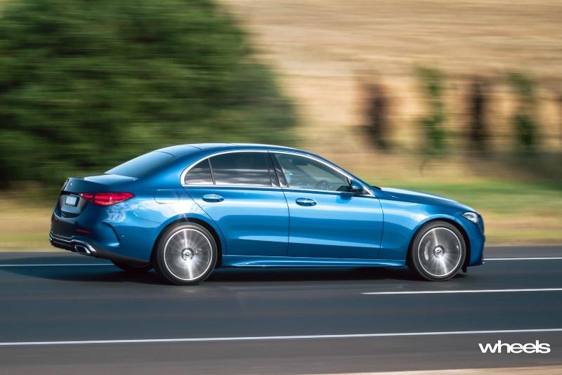 2022_Mercedes-Benz_C300_Spectral_Blue_Metallic_Australia_dynamic_side_06.jpg