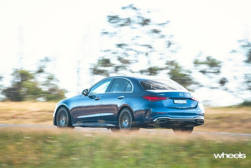2022_Mercedes-Benz_C300_Spectral_Blue_Metallic_Australia_dynamic_rear_08.jpg