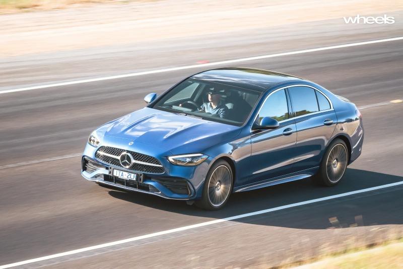 2022_Mercedes-Benz_C300_Spectral_Blue_Metallic_Australia_dynamic_front_21.jpg