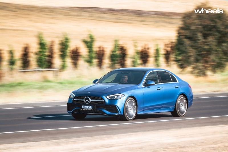 2022_Mercedes-Benz_C300_Spectral_Blue_Metallic_Australia_dynamic_front_19.jpg