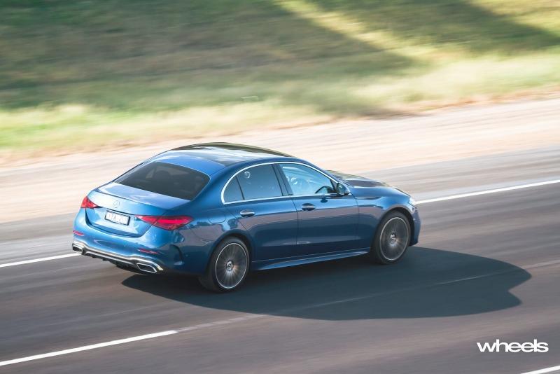 2022_Mercedes-Benz_C300_Spectral_Blue_Metallic_Australia_dynamic_rear_11.jpg