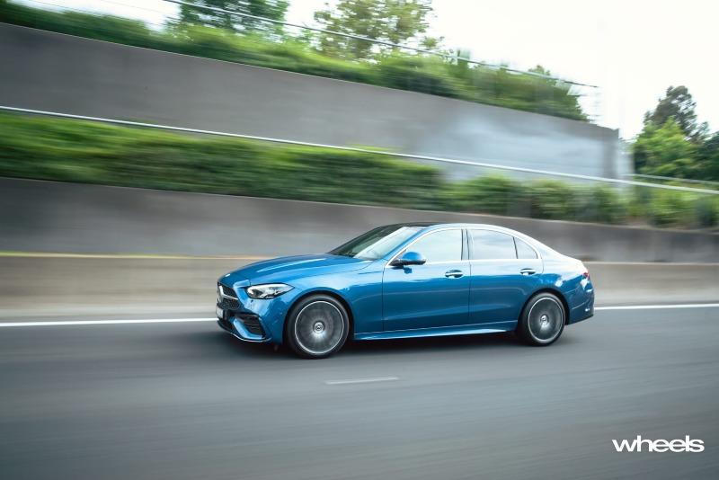 2022_Mercedes-Benz_C300_Spectral_Blue_Metallic_Australia_dynamic_side_08.jpg