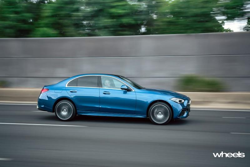 2022_Mercedes-Benz_C300_Spectral_Blue_Metallic_Australia_dynamic_side_12.jpg