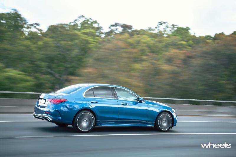 2022_Mercedes-Benz_C300_Spectral_Blue_Metallic_Australia_dynamic_rear_13.jpg