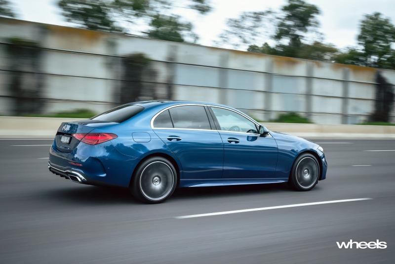 2022_Mercedes-Benz_C300_Spectral_Blue_Metallic_Australia_dynamic_rear_15.jpg