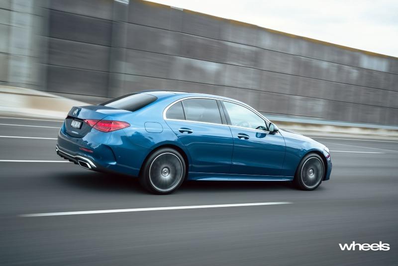 2022_Mercedes-Benz_C300_Spectral_Blue_Metallic_Australia_dynamic_rear_16.jpg