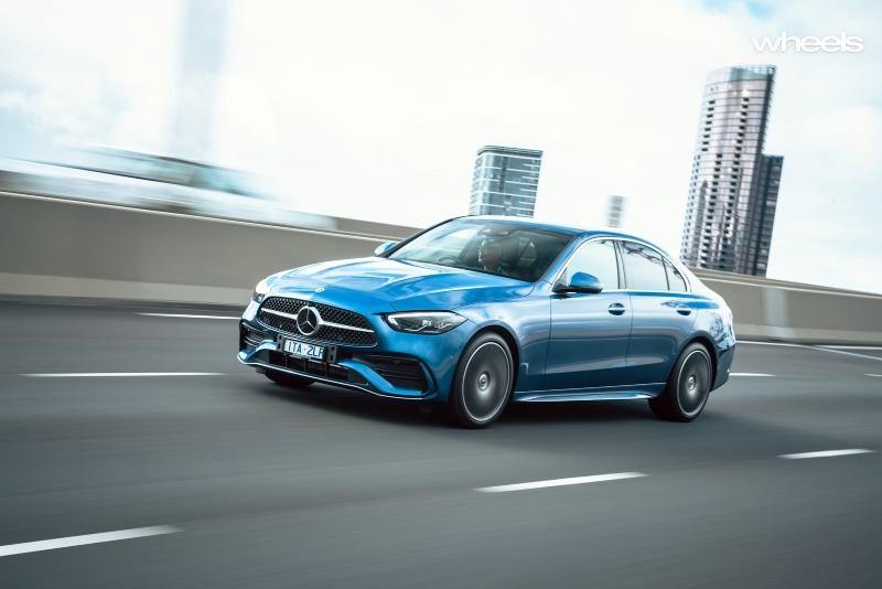 2022_Mercedes-Benz_C300_Spectral_Blue_Metallic_Australia_dynamic_front_23.jpg