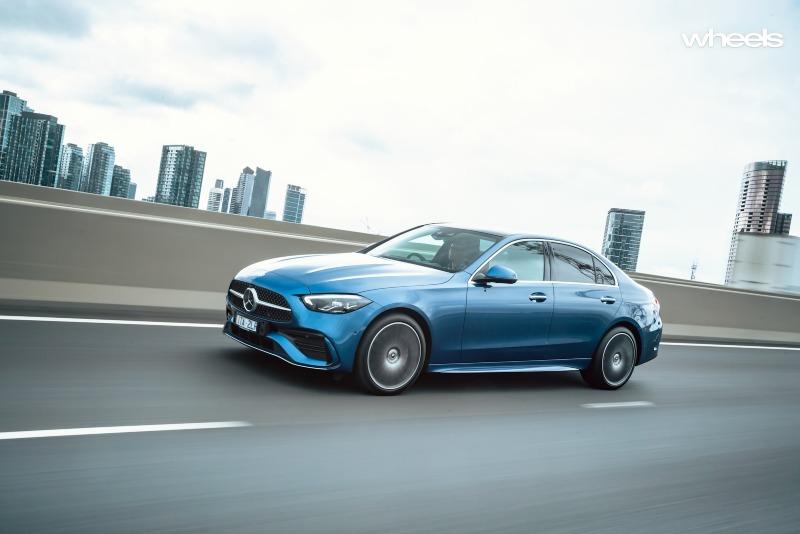 2022_Mercedes-Benz_C300_Spectral_Blue_Metallic_Australia_dynamic_front_24.jpg