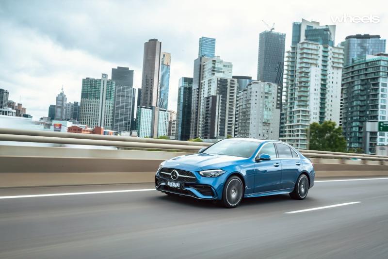 2022_Mercedes-Benz_C300_Spectral_Blue_Metallic_Australia_dynamic_front_25.jpg
